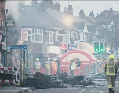  ??  ?? BLAST HORROR: The scene on Hinckley Road, Leicester as emergency services dealt with the aftermath of a huge explosion.
