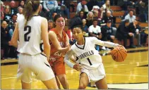  ?? DAN COYRO – SANTA CRUZ SENTINEL FILE ?? Former star Cabrillo College guard Heleyna Hill, shown taking advantage of a screen set by center Maddy Miller against Siskiyous in 2019, has returned to the court for Dominican University of California.