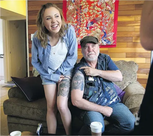  ?? — PHOTOS: COURTESY OF TIGHELAND PRODUCTION­S ?? A sober Richard Lett and daughter Breanna show off their matching tattoos.