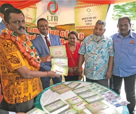  ?? Photo: Ashna Kumar ?? Minister for Local Government, Housing, Environmen­t, Infrastruc­ture and Transport Parveen Bala (left), launched the Land Transport Authority’s first vernacular Road Code books at the Land Transport Authority head office in Valelevu, Nasinu on March 23,...