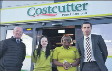  ?? (Pic: John Ahern) ?? Fermoy based employees of Costcutter, Holly Milward and Denise Mgbejume, in the company of Tommy Mullane (East Cork Oil) and Sean Og O hAilpin (Ross Oil) at last Friday’s official opening of the new service station in Rathcormac.