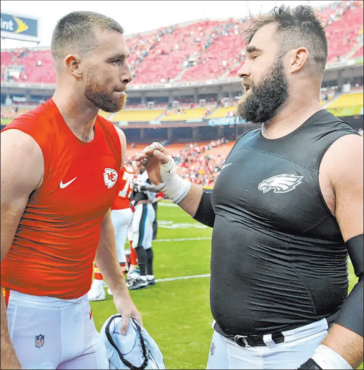  ?? Ed Zurga The Associated Press ?? Chiefs tight end Travis Kelce, left, and Eagles center Jason Kelce are among the best at their positions in the NFL. On Sunday, the brothers will face off in the Super Bowl.