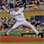  ?? PATRICK FARRELL / MIAMI HERALD ?? Marlins starting pitcher Jeff Brigham struggled to get through three innings Sunday in a loss to the Blue Jays in Miami. Brigham walked four batters and hit another.