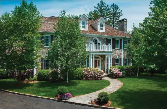  ?? Contribute­d by Houlihan Lawrence ?? Houlihan Lawrence’s Greenwich brokerage represents the seller of 15 Parsonage Rd., Greenwich—a six-bedroom Georgian colonial on a 1.01-acre landscaped lot, close to town. The asking price for the property is $5.995 million.