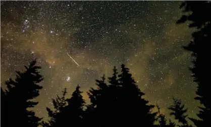  ?? ?? A meteor streaks across the sky during the annual Perseid meteor shower in August 2021. Photograph: REX/Shuttersto­ck