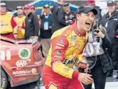  ?? MATT KELLEY/AP ?? Former NASCAR Cup Series champion Joey Logano celebrates after ending a 40-race winless drought with a victory Sunday at Darlington Raceway.