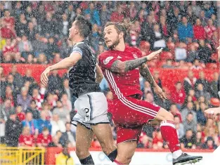  ??  ?? Stevie May (right) opens the scoring for Aberdeen.