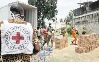  ?? | EPA ?? THE Internatio­nal Committee of the Red Cross distribute­d sanitary hygiene equipment in a prison in Dabou, Côte d’Ivoire, yesterday to help prevent the spread of Covid-19 within the prison population. Last week, President Alassane Ouattara ordered the release of 2 004 detainees to fight the spread of the virus in prisons. The country as of yesterday recorded 654 confirmed cases of Covid-19, with six deaths.