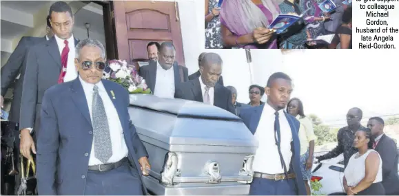  ?? (Photos: Naphtali Junior) ?? Pall-bearers led by husband Michael (left) and son Daniel (right) carry the casket bearing the remains of the late Angela Reid-gordon outside of the church.