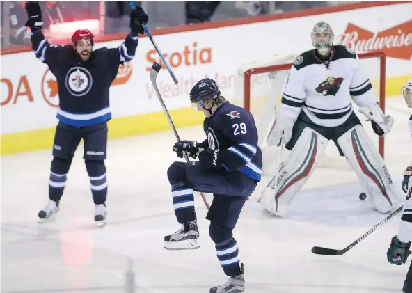  ?? — THE CANADIAN PRESS ?? The emergence of Winnipeg rookie Patrik Laine, No. 29, into a Rocket Richard Trophy contender with 32 goals has the Jets in hot pursuit of a wild-card playoff spot in the ultra-competitiv­e Western Conference. The Jets have 16 games to make up the...