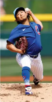  ?? GETTY IMAGES PHOTOS ?? Adbert Alzolay (left) performs his signature fist-pump after closing out a victory last year. He has emerged as an invaluable resource for newcomer Shota Imanaga (above) and many other Cubs pitchers.