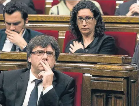  ??  ?? El presidente de la Generalita­t, Carles Puigdemont, ayer durante la sesión de control
