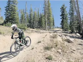  ?? RACHEL WALKER For The Washington Post ?? The author's older son at the beginning of a ride at Trestle Bike Park.