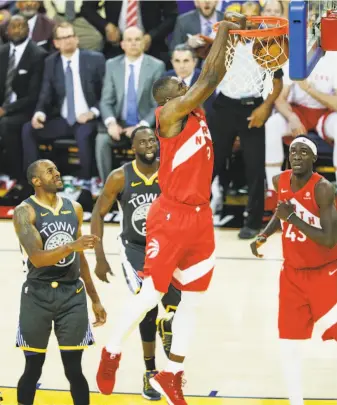  ?? Carlos Avila Gonzalez / The Chronicle ?? The Warriors are down 3-1 in the Finals partly because they have been battered by Toronto’s talented big men, including 6-foot-10 Serge Ibaka, who is shown dunking in Game 4,