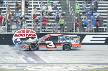  ?? RAY CARLIN — THE ASSOCIATED PRESS ?? Austin Dillon crosses the finish line to win the Monster Energy Cup Series race July 19 at Texas Motor Speedway.