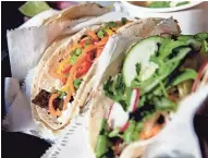  ?? JOURNAL SENTINEL FILES ?? Gypsy Taco’s specialty will be among the foods at The Little Gig on June 25 outside Dandan.