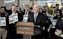  ?? BRIAN CASSELLA/CHICAGO TRIBUNE ?? Mayoral candidate Bill Daley accepts endorsemen­t by Chicago Journeymen Plumbers and Technical Engineers Local Union 130 on Thursday.