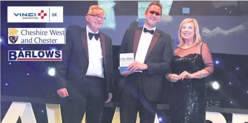  ??  ?? Jeremy Orrell, managing partner of awards sponsor SAS Daniels LLP, with winner of Business Person of the Year Jonathan Fell and host Lucy Meacock at the Cheshire Business Awards 2018 at Chester Cathedral