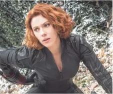  ??  ?? Black Widow/Natasha Romanoff (Scarlett Johansson) adds her skills to the macho arsenal of the superhero cast.