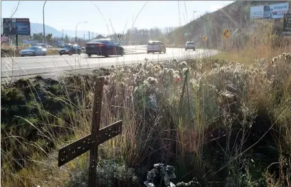  ?? Penticton Herald ?? A roadside memorial sits on Highway 97 just north of Penticton, where 61 vehicles have crashed over a 10-year period.