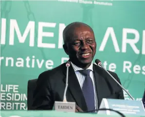  ?? Picture: Alaister Russell ?? A rare smile from Judge Dikgang Moseneke as he delivers his award statement this week to the families of those who died in the Esidimeni tragedy.