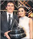  ??  ?? WIN: Thomas, wife &amp; award