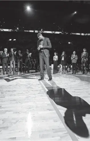  ?? Edward A. Ornelas / San Antonio Express-News ?? Tim Duncan, here at his jersey retirement ceremony on Dec. 18, 2016, will be back at the AT&T Center in an official capacity for the Spurs this fall as one of Gregg Popovich’s assistant coaches.