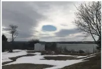  ??  ?? So glad that Heather Lewis was looking up on Saturday! This hole in the cloud appeared over Whitney Pier, NS...