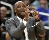  ?? JOHN RAOUX — THE ASSOCIATED PRESS ?? Newly annointed Cavaliers head coach Larry Drew directs his players on the court against Orlando on Monday.