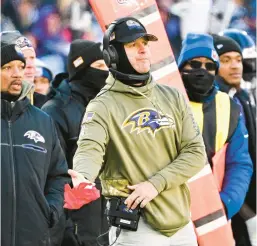  ?? TERRANCE WILLIAMS/AP ?? Ravens coach John Harbaugh, center, challenges a touchback call during the second half of a win against the Carolina Panthers.“Really, you just beg guys not to get into the Twitter world right after the game, especially after a loss,” Harbaugh said Monday.