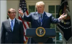  ??  ?? In this May 11 file photo President Donald Trump speaks during an event about prescripti­on drug prices with Health and Human Services Secretary Alex Azar in the Rose Garden of the White House in Washington. AP PhoTo/CArolyn KAsTer, FIle