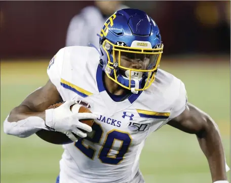  ?? AP FILE ?? SPEED KILLS: South Dakota State running back Pierre Strong runs with the ball during a game against Minnesota in 2019.