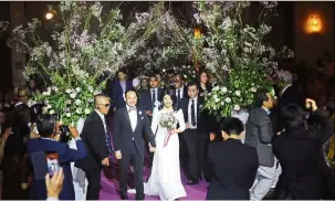  ??  ?? Newly-weds: Yeo and Lee at their wedding reception at Le Meridien, Putrajaya. — Bernama