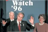  ?? Joe Marquette, The Associated Press ?? Republican presidenti­al candidate Bob Dole, flanked by his wife, Elizabeth, and Sen. John McCain, waves to supporters during his concession speech on Nov. 5, 1996, in Washington. President Bill Clinton won reelection.