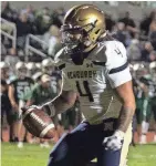  ?? ALLYSE PULLIAM FOR THE TIMES HERALD-RECORD ?? Newburgh’s Tajir Walker runs for a touchdown against Minisink Valley in Slate Hill on Sept. 14.