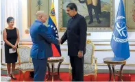  ?? AFP-Yonhap ?? Venezuela’s President Nicolas Maduro (right) shakes hands with Internatio­nal Criminal Court prosecutor Karim Khan in Caracas, Venezuela, Monday.