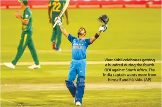  ??  ?? Virat Kohli celebrates getting a hundred during the fourth ODI against South Africa. The India captain wants more from himself and his side. (AP)