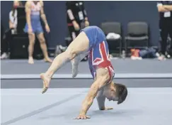  ??  ?? MAKING HISTORY: Luke Whitehouse is the first British artistic gymmast to pull off a triple back somersault on the floor.