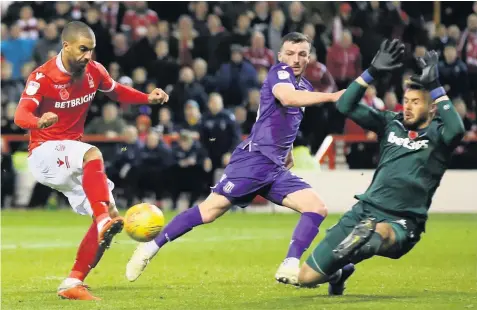  ??  ?? KEEPING IT CLEAN: Stoke City goalkeeper Jack Butland made several important saves at the City Ground to deny Nottingham Forest and was on the spot when Lewis Grabban looked as though he might win it for the home side.