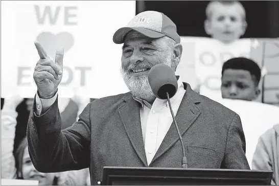  ?? [KYLE ROBERTSON/DISPATCH PHOTOS] ?? ECOT founder Bill Lager speaks Tuesday at the Statehouse rally. He urged lawmakers to continue support for the school despite criticism of ECOT’s enrollment numbers, spending of tax dollars and below-average graduation rate.