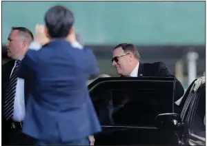  ?? AP/JULIE JACOBSON ?? Secretary of State Mike Pompeo arrives to have dinner Thursday in New York with North Korea’s Kim Yong Chol in advance of the highest-level talks between the two countries on American soil in 18 years.
