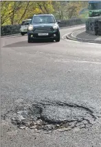  ?? 1IF F44 Spean Bridge pothole02 ?? BEAR Scotland is having to return to Spean Bridge to tackle reappearin­g potholes.