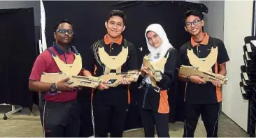 ??  ?? The students from SMK Bandar Tun Hussein Onn trying out laser tag.
