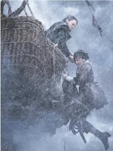  ?? AMAZON ?? Eddie Redmayne, left, and Felicity Jones reunite in The Aeronauts. John Boyega, below, stars as Finn in Star Wars: The Rise of Skywalker.