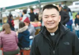  ?? SEAN FOWLER PHOTOS/SPECIAL TO THE COURANT ?? The Rev. Tuan Anh Dinh Mai, known to everyone as Father Andy, is the pastor of the quasi-parish of St. Andrew Dung-lac, which is at St. Mark the Evangelist in West Hartford. He founded the Vietnamese Night Market in 2019.