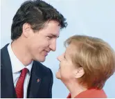  ??  ?? Justin Trudeau et Angela Merkel, vendredi, à Hambourg. − La Presse canadienne: Ryan Remiorz