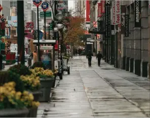  ?? AFP) ?? A usually-crowded 34th Street sits empty during the Macy’s Thanksgivi­ng Day Parade in New York on Thursday. (