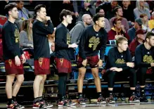  ?? AP Photo/Matt York ?? ■ Arizona State players watch from the bench during the first half against Washington State on Thursday in Tempe, Ariz. The players at the end of the bench watch the score running up and the clock winding down, wondering when it will be their turn to finally get a chance to play. Most of the time, it doesn’t happen until the final minute—even when a game has long been out of reach.