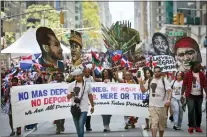  ?? BEBETO MATTHEWS, FILE - THE ASSOCIATED PRESS ?? A group calling for the end of deportatio­ns marches in the Dominican Day Parade, in 2017, in New York.