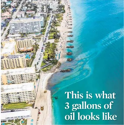  ?? CITY OF DEERFIELD BEACH/COURTESY ?? A photo taken at the Deerfield Beach-Hillsboro Beach line on March 19 shows a slick of hydraulic oil. A company working on a beach renourishm­ent project traced the spill to equipment failure.